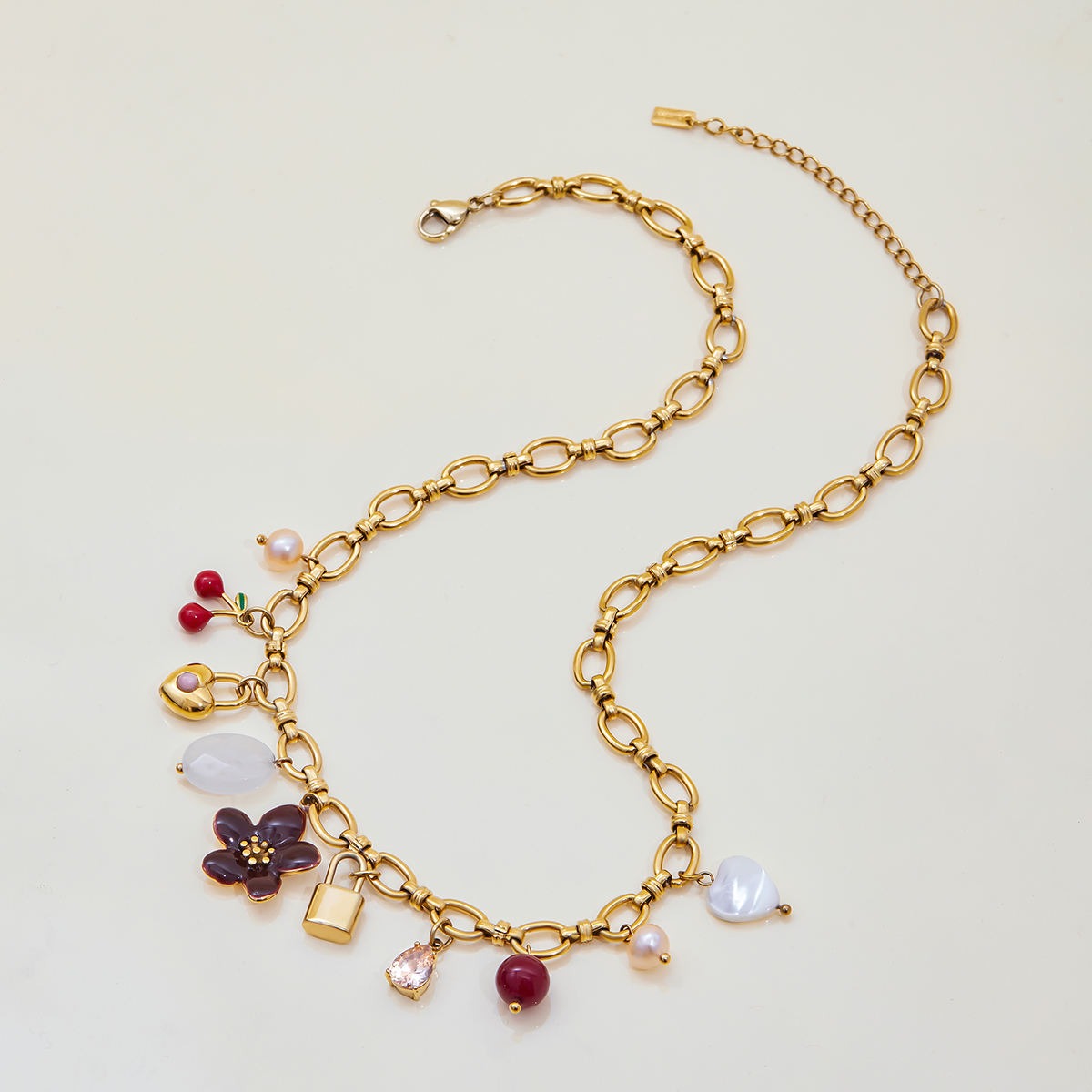 Aura Or - Collier charms cœur, fleur et perles