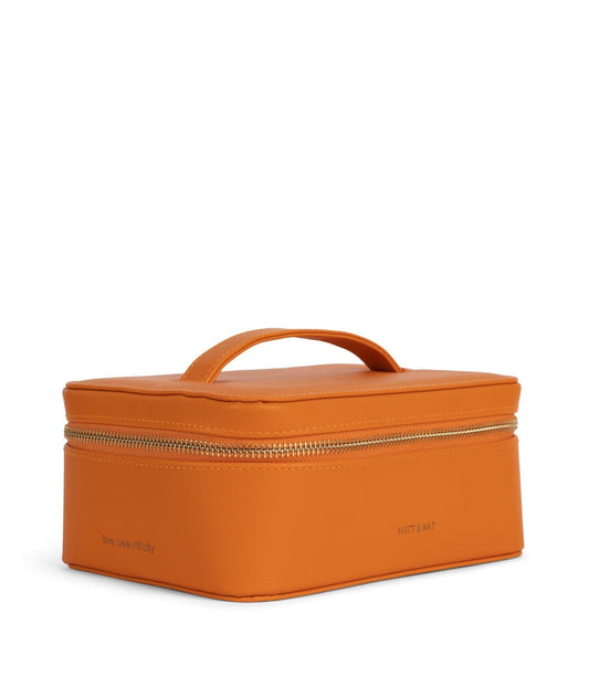 Trousse de toilette vanity rigide en cuir vegan orange de la marque canadienne Matt & Nat. Fabriqué à partir de bouteilles en plastique 100 % recyclées.