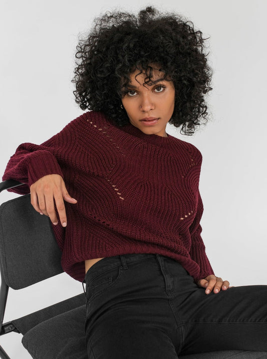 Pull en tricot motif ajouré