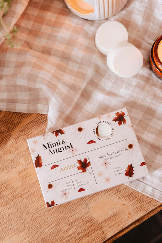 fondants de cire Ambre posés près d’un brûleur – diffusion parfum longue durée