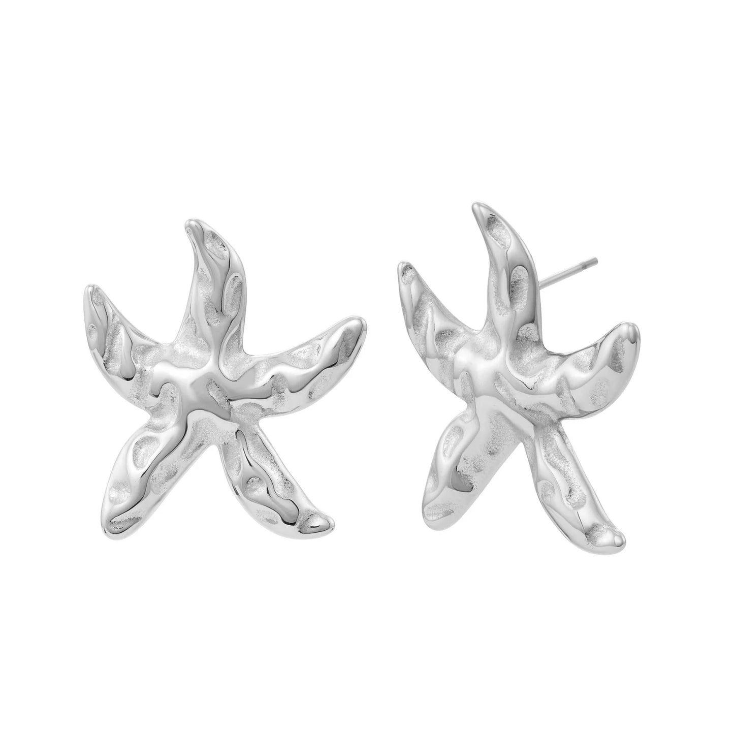 Boucles d’oreilles en forme d’étoile de mer en argent texturé – bijou marin vue studio sur fond blanc