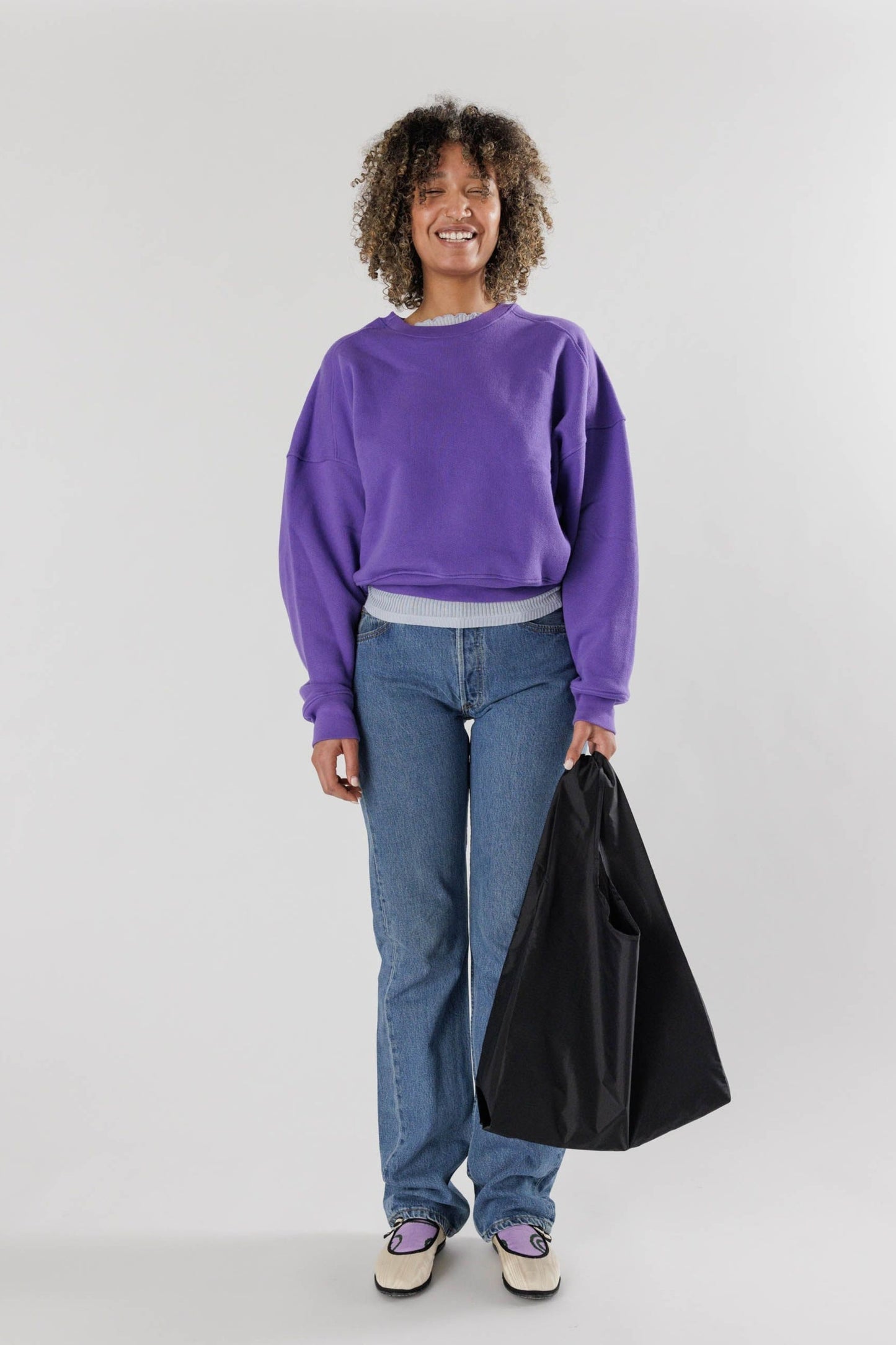 sac noir porté à l’épaule – format pliable robuste 50 lb