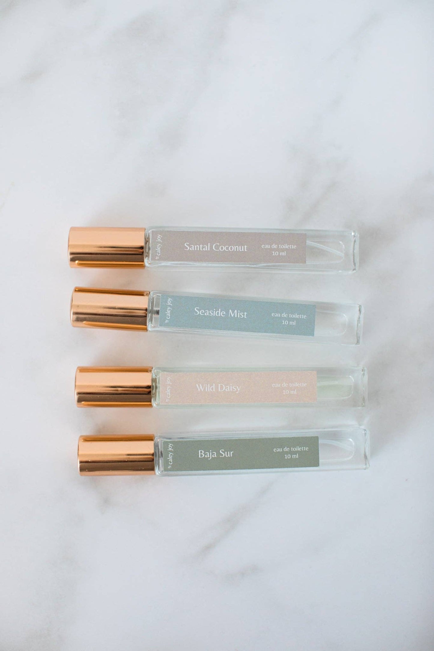 Collection de parfums format voyage 10 ml + flacon minimaliste capuchon dore