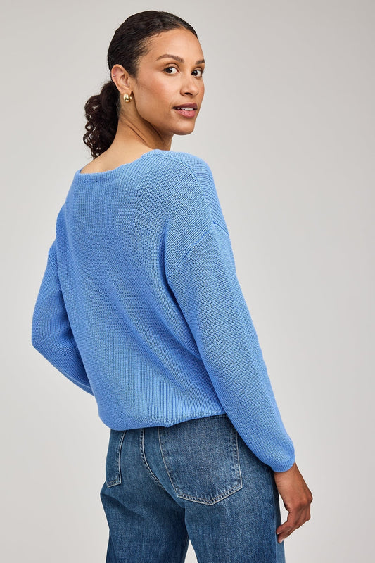 Vue de dos du pull bleu pacifique coupe décontractée en point demi-cardigan