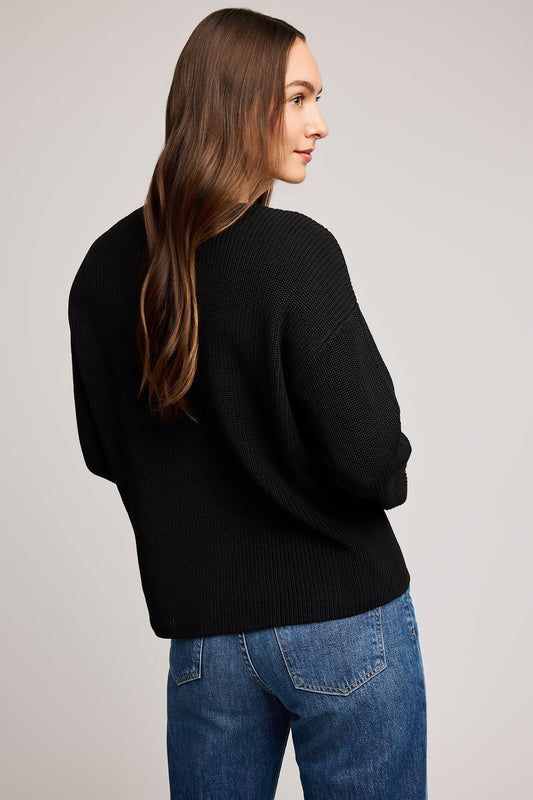 Vue de dos du pull noir coupe décontractée en point demi-cardigan