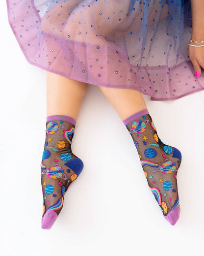 Chaussettes transparentes noires à motifs planètes pop art