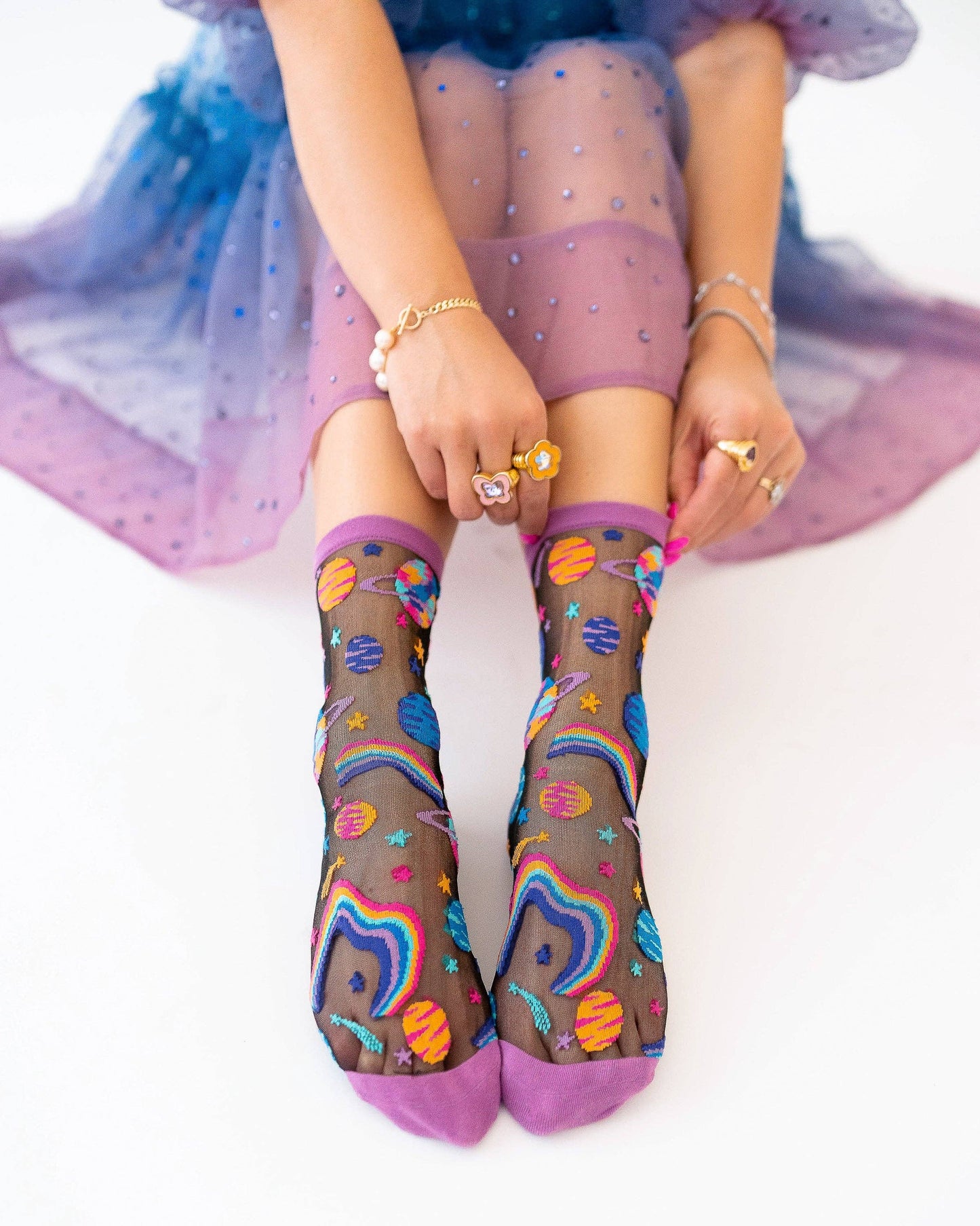 Chaussettes transparentes noires à motifs planètes pop art