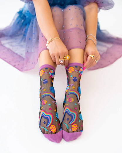 Chaussettes transparentes noires à motifs planètes pop art