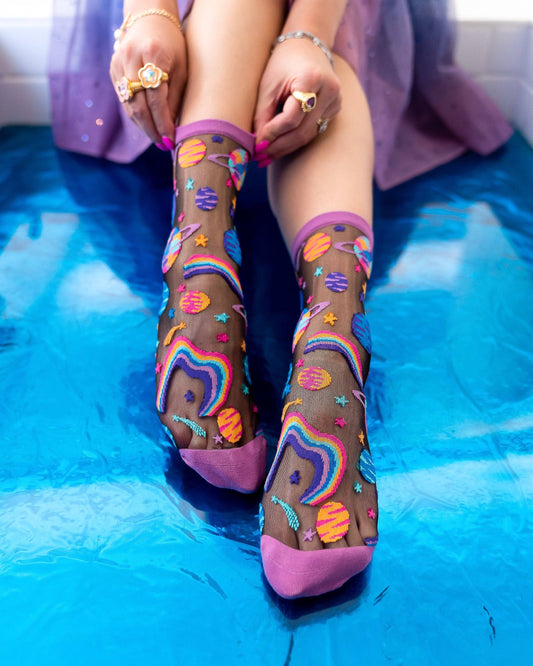 Chaussettes transparentes noires à motifs planètes pop art