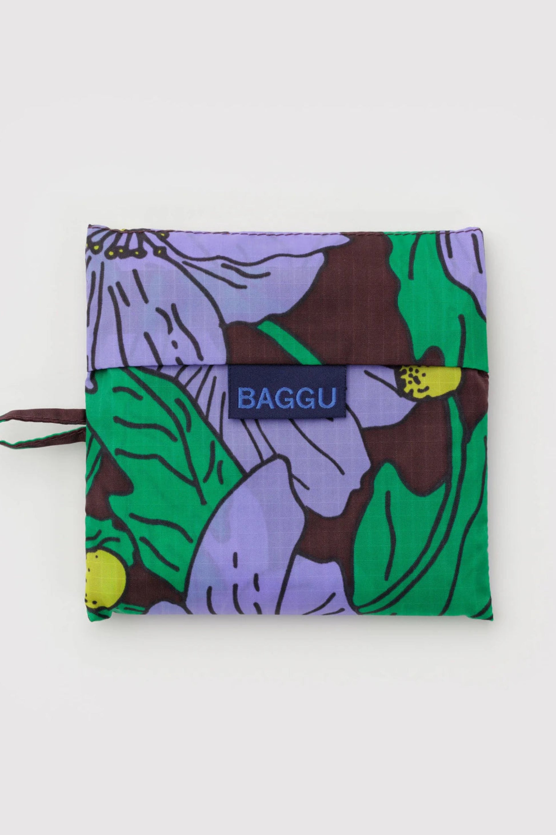 Pochette du sac réutilisable Coquelicots en nylon recyclé, motif floral violet et vert.