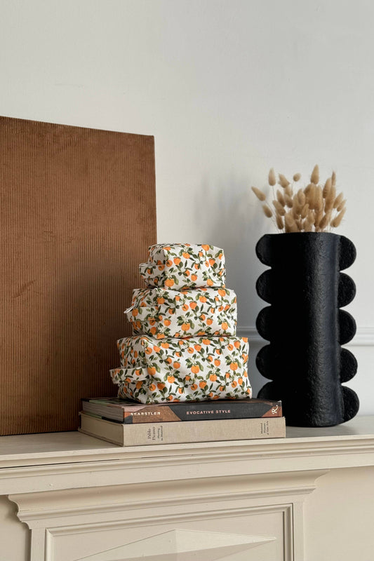 Ensemble de trousses maquillage coton motif clémentine empilées