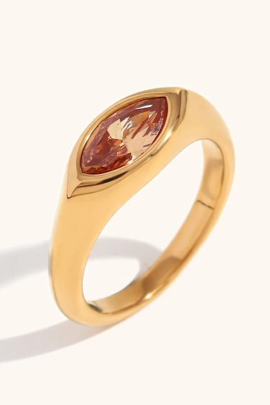 Anneau doré en acier inoxydable avec zircon marquise violet