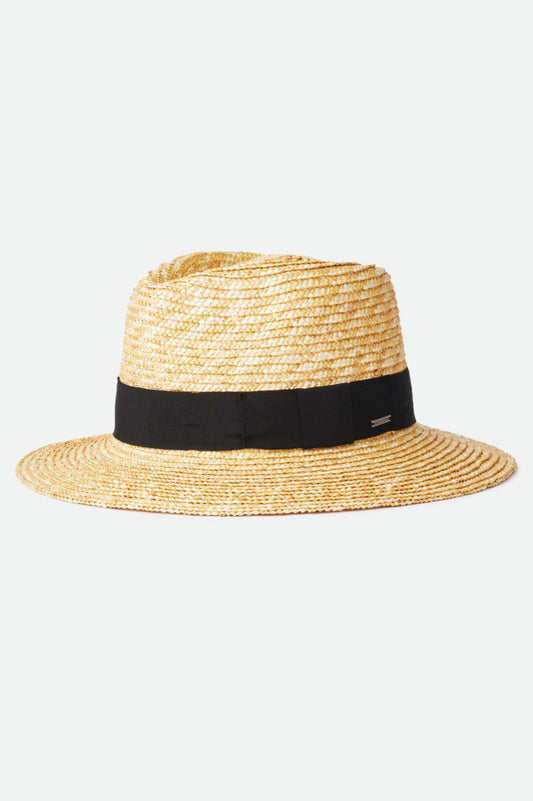 Chapeau Barbara noir en paille naturelle présenté de côté, avec bande noire en gros-grain et bord large protecteur.