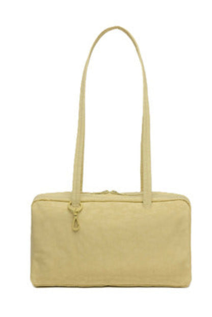 Sac Bowler Jaune présenté de face avec longues bandoulières et fermeture zippée.