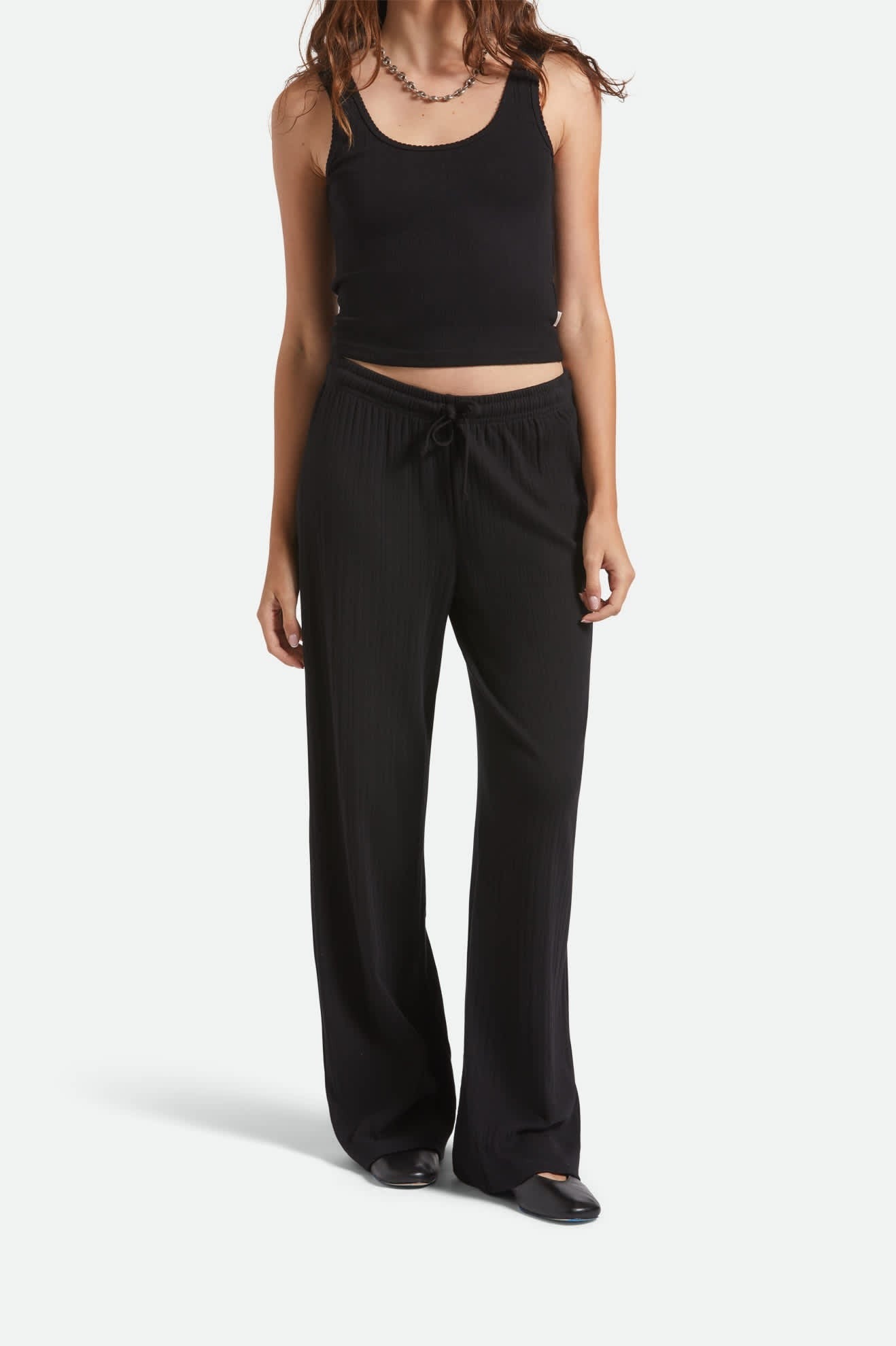 Pantalon pointelle noir Brixton vu de face – taille élastique et cordon de serrage