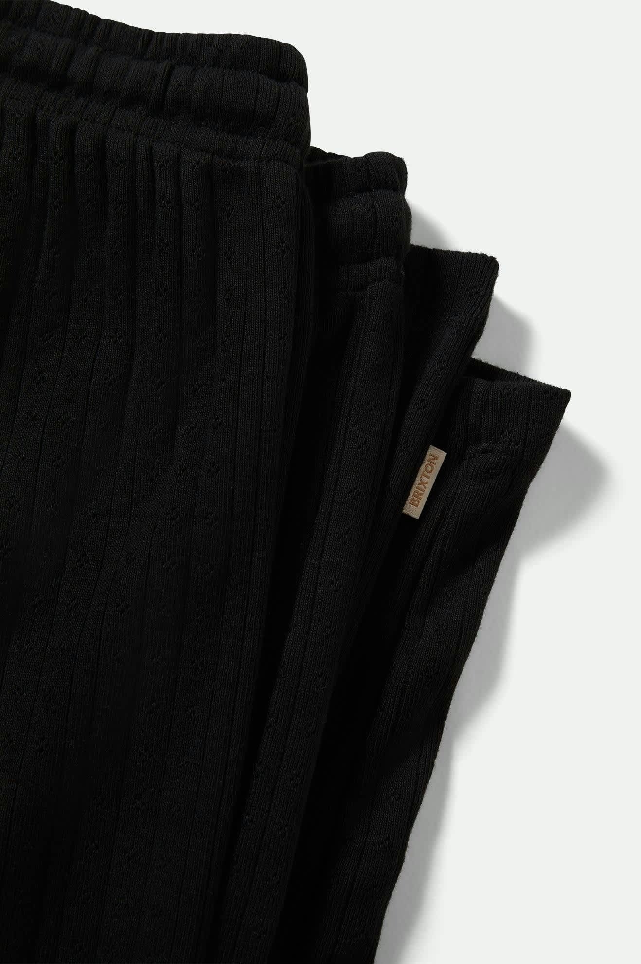 Pantalon pointelle noir Brixton vu de profil – poches intégrées