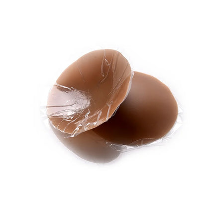 Cache-tétons waterproof en teinte foncée, invisibles sous les vêtements pour peaux foncées