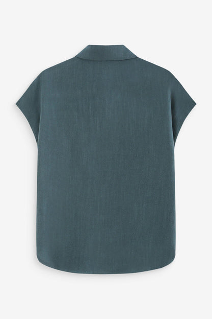 Chemise émeraude vue de dos avec coupe fluide