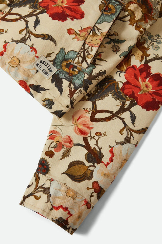 Gros plan sur la poche de la veste Lily, tissu floral de la veste Lily, coton texturé imperméable