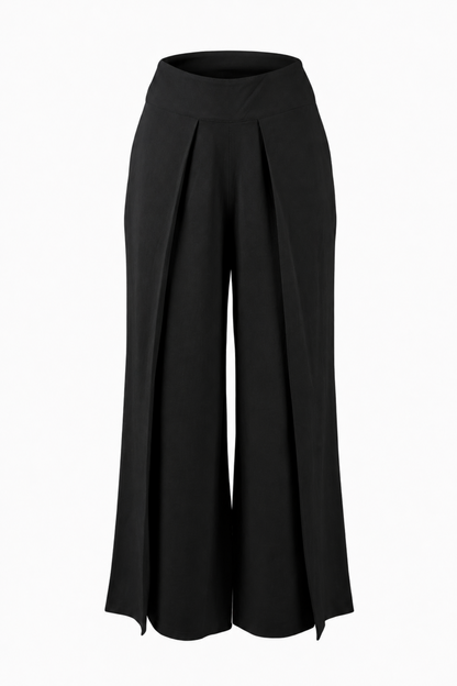 Pantalon Dubai noir présenté seul, avec coupe ample, taille élastique, plis à l’avant et tissu fluide léger.