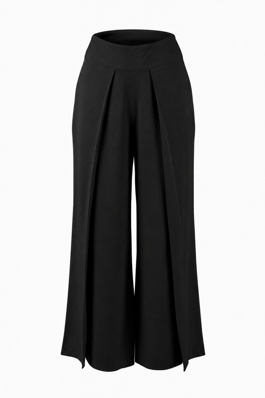 Pantalon Dubai noir présenté seul, avec coupe ample, taille élastique, plis à l’avant et tissu fluide léger.
