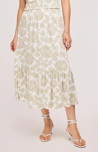 Vue de face de la jupe Elaine à imprimé floral matcha et coupe midi