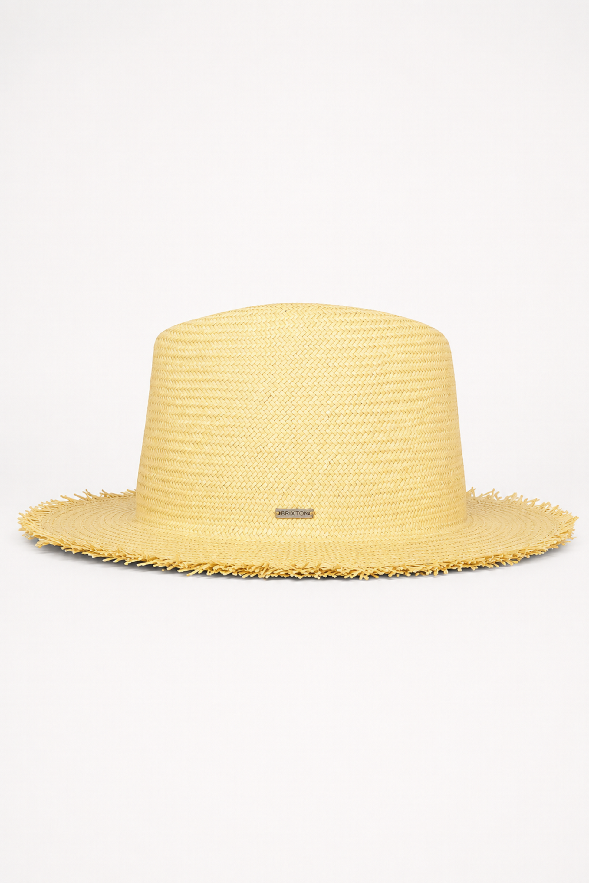 Chapeau Filly en paille vu de côté avec forme structurée, large bord frangé et finition naturelle.