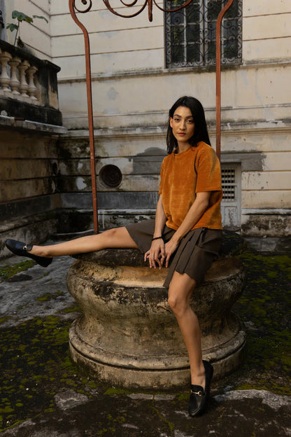 Mini-jupe portefeuille verte en coton extensible vue de face