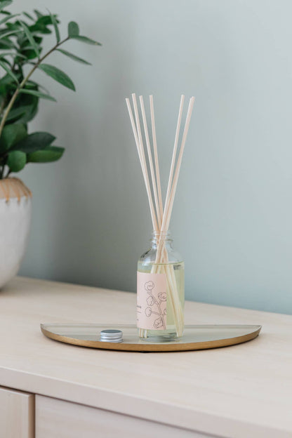 Diffuseur Lin a volants avec roseaux en bois naturels et bouteille en verre recyclable