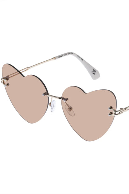 Lunettes de soleil Lucie Marbre Or vues de côté, avec branches fines dorées et verres beige.