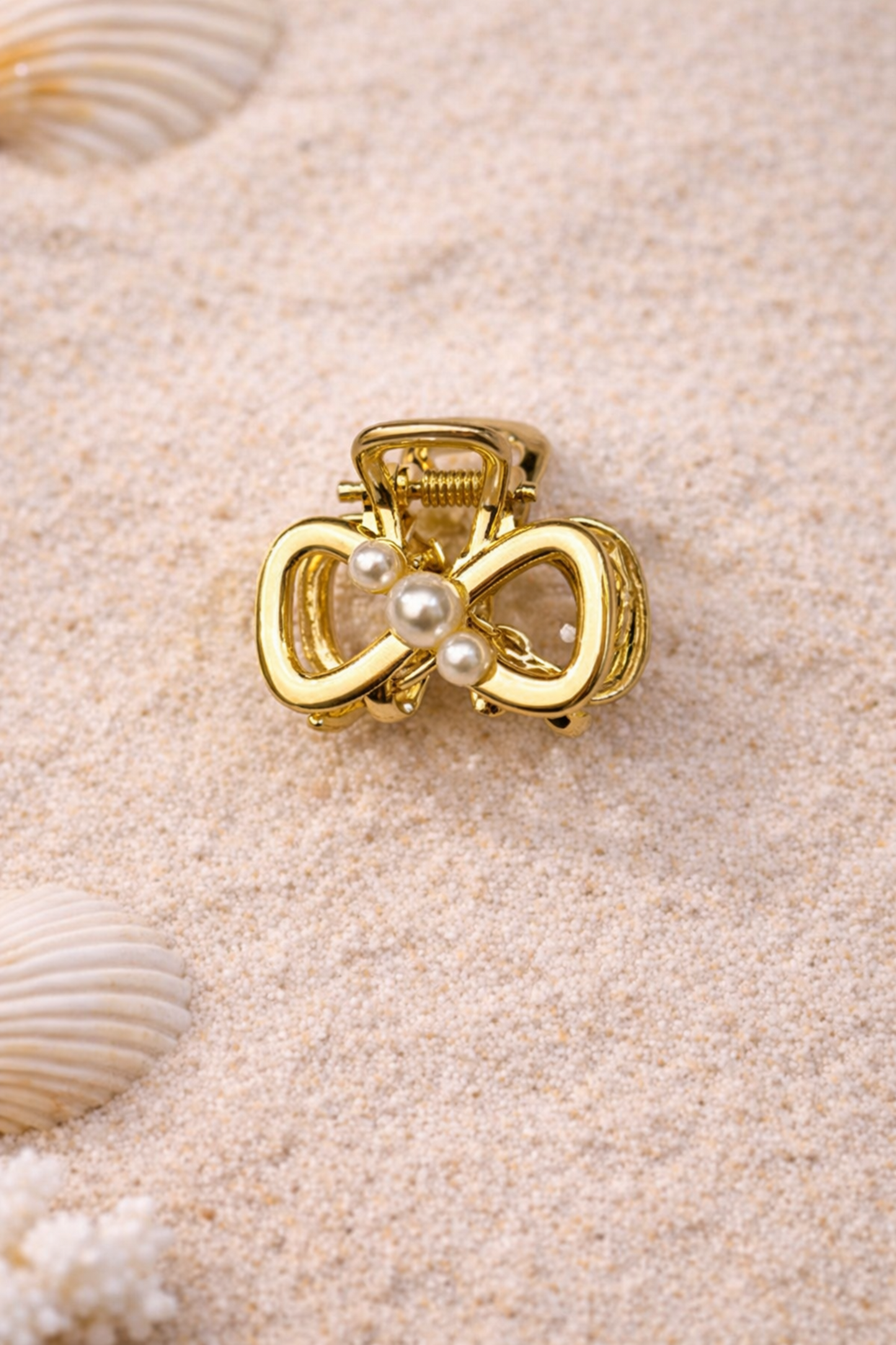 mini pince doree forme noeud avec perles blanches + accessoire feminin elegant