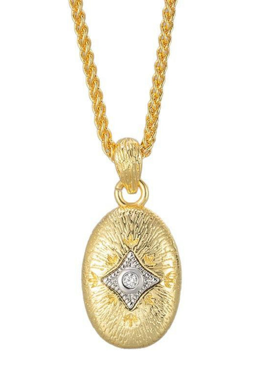 Collier Opale doré avec médaille ovale gravée, détail argenté et pierre brillante au centre.