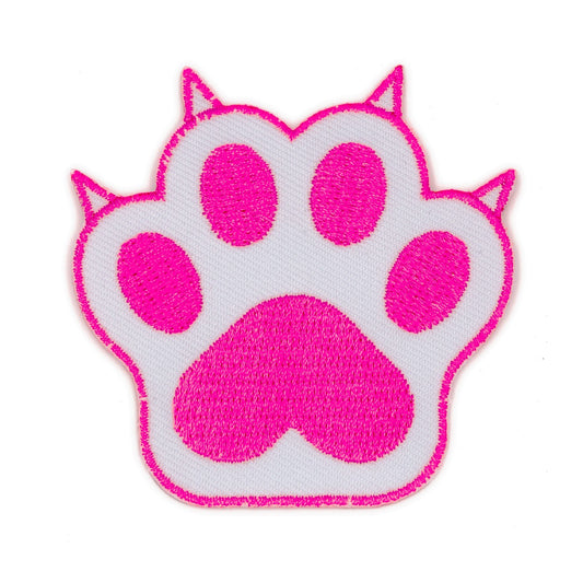 Patch en forme de patte de chat blanche et rose fluo avec des griffes. L’arrière-plan est un fond blanc. 