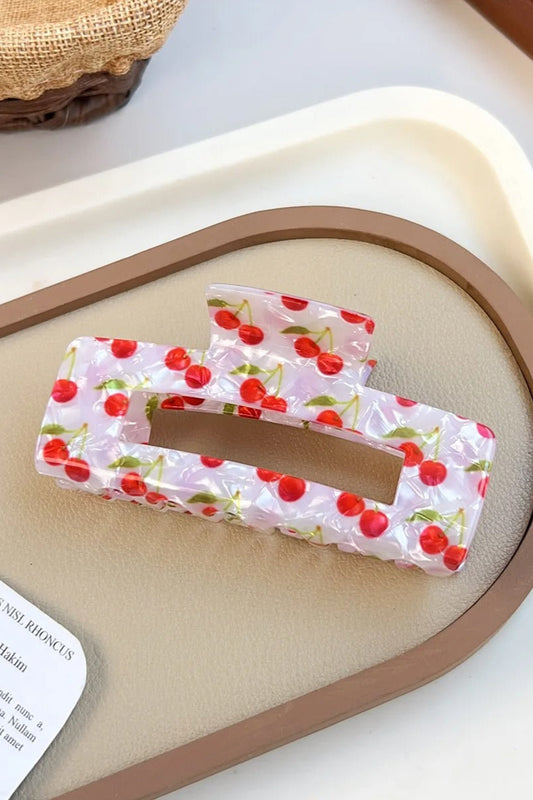 Pince à cheveux en acétate grand format 10,3 cm avec motif cerises, vue de dessus