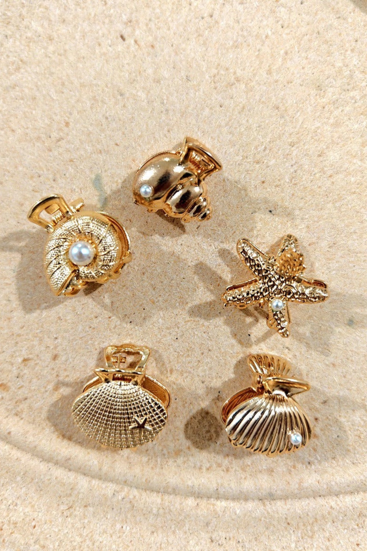 Ensemble de pinces cheveux dorées motifs étoile de mer, conque, bénitier et escargot de mer avec perle décorative
