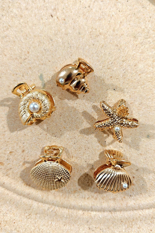 Ensemble de pinces cheveux dorées motifs étoile de mer, conque, bénitier et escargot de mer avec perle décorative