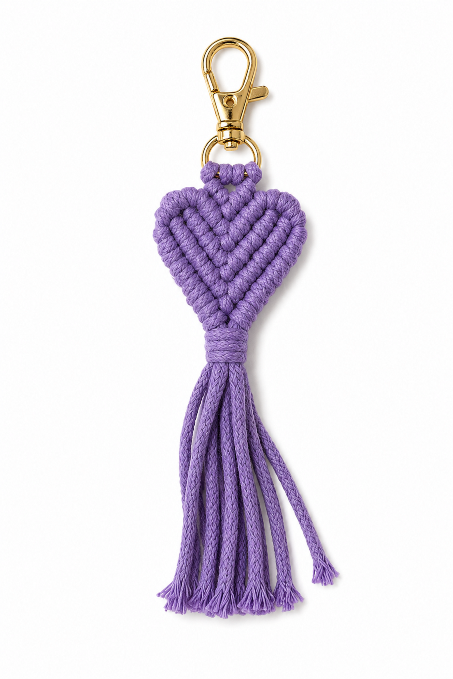 Porte-clé cœur en macramé mauve avec frange décorative et mousqueton doré.