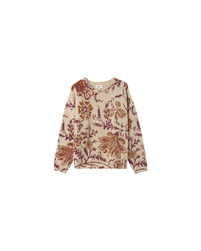 Pull en laine beige fleuri à encolure ronde en laine. Vu de devant sur fond blanc.