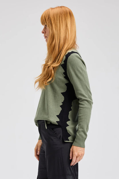 Vue de côté du pull Molly sauge avec empiècements noirs