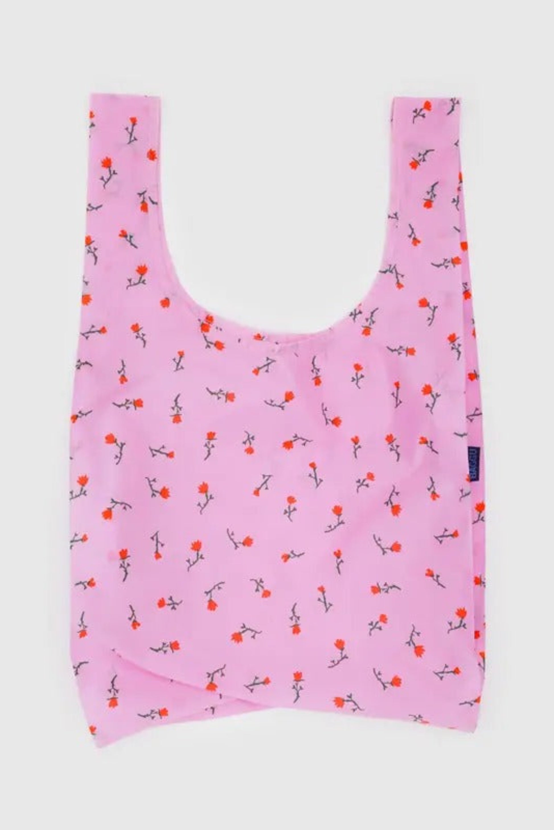 Vue du sac réutilisable Baggu déplié avec motif fleurs sauvage peinte