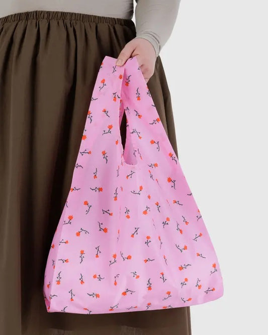 Sac Baggu porté à la main, imprimé fleurs rouges sur fond rose