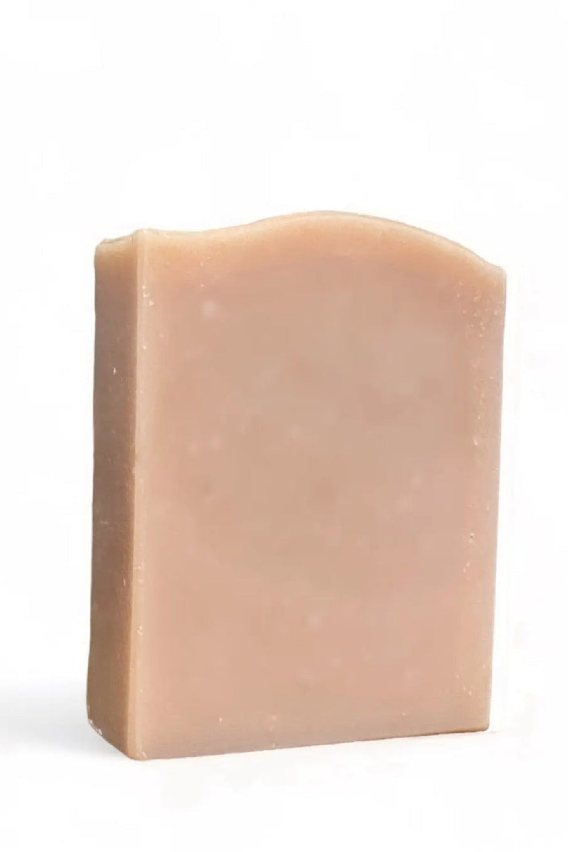 Pain de savon artisanal rose et lys photographie sur fond clair parfum floral délicat