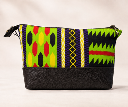 Trousse Wax Fluo Noir Kazak avec tissu coloré à motif graphique, base noire en cuir recyclé et fermeture éclair.